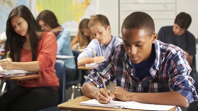Students testing in classroom, Ben Castleman,  Andrew Barr, College Completion and Advising 