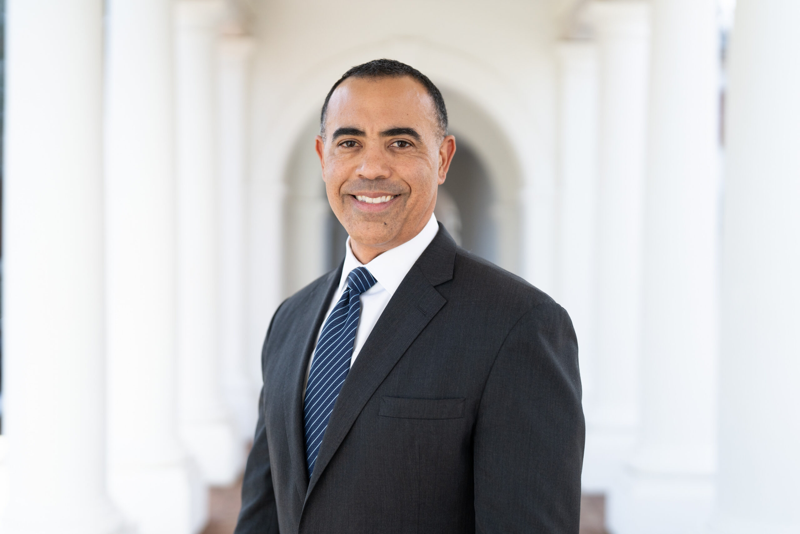 FBS Image of Dean standing in hallway near Rotunda