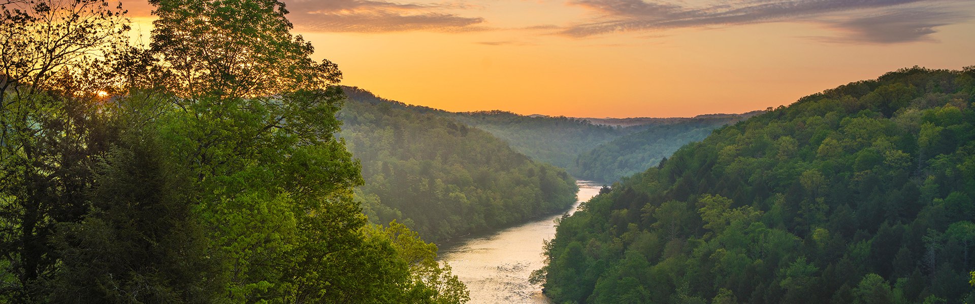 Appalachian mountains and river at dusk